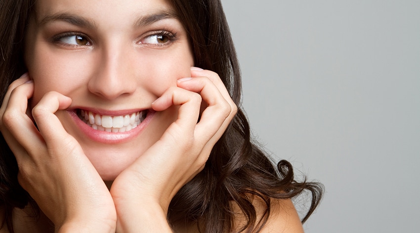 Very happy woman with mercury-free fillings